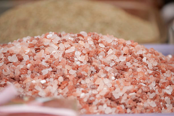 istock Pink Himalayan salt in a market display 2250007529