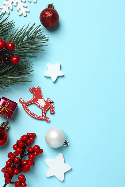 istock Christmas decorations on blue background,  seasonal greeting 2250008406