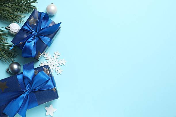 istock A festive arrangement with blue gift boxes, top view. Concept for celebrating Christmas 2250008408