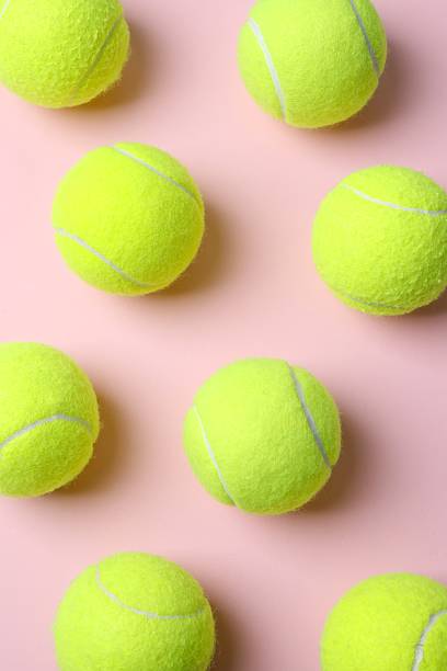 istock Tennis balls on a pink background 2250013904