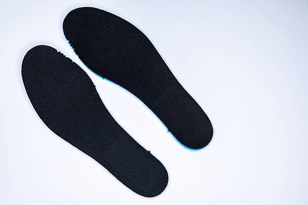 istock Shoe inserts on a white background. Comfortable orthopedic shoe accessories. 2250016104