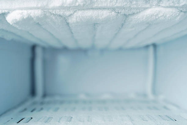 istock Empty frosty freezer interior with ice buildup and copy space, background for freezing services, cold storage ads and offers. 2250020193
