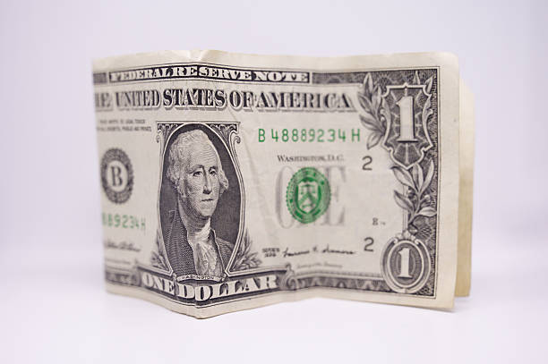 istock one dollar banknotes in top view isolated 2250020288
