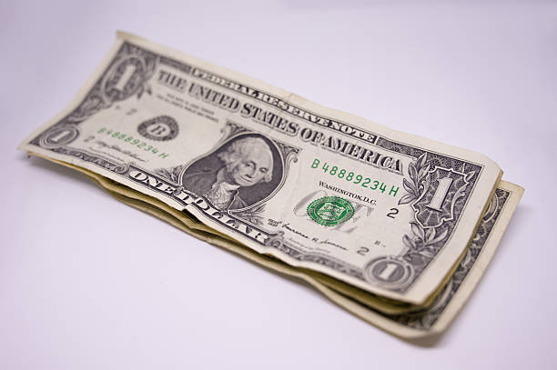 istock one dollar banknotes in top view isolated 2250020315