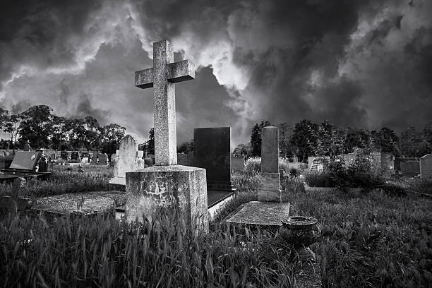 istock Spooky cemetery on a cloudy autumn day 2250022384