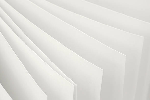 Old run-down manila folder with papers isolated on white background