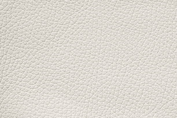 istock Fine Grain Leather Texture, color offers elegant minimal surface with soft tactile depth and modern clarity. Natural background with refined Cloud Dancer texture for clean stylish compositions 2250024385