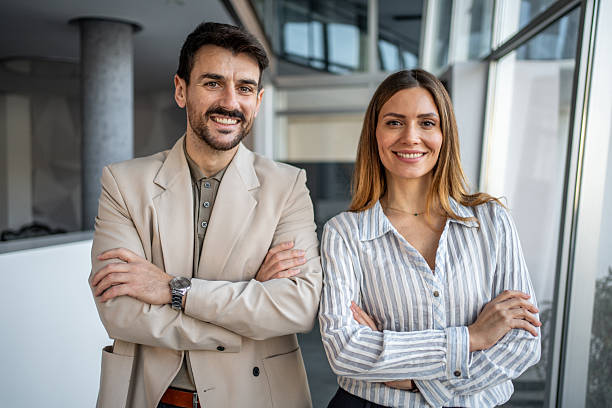 istock Professional business partners standing in modern office 2250025435
