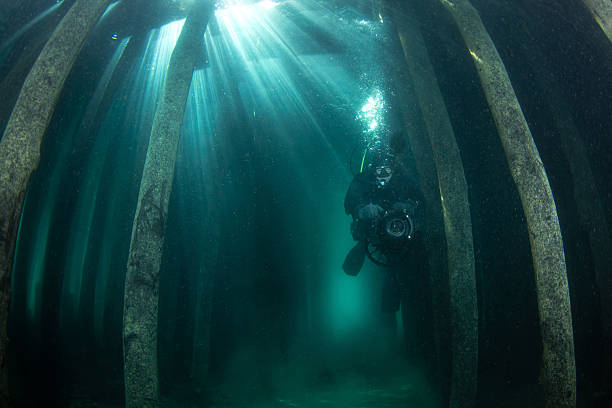 istock Underwater Scooter Ride Through Jetty Shadows 2250028216