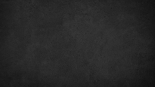 istock black wall with a white paint.  wall is very plain and has no decorations. The wall is made of concrete. black texture background for template, page or web banner 2250028834