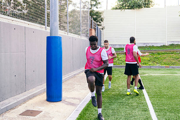 istock Athletes training on soccer field preparing for match 2250030965