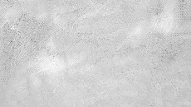 istock A white wall with a few lines drawn on it. The wall is very plain and has no decoration 2250032156