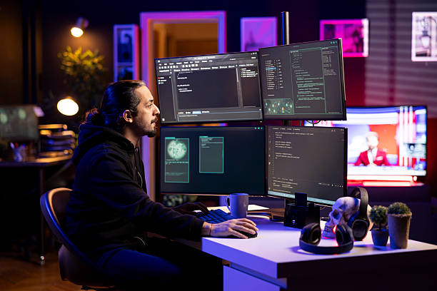 istock Hacker in secret hideout uses ransomware attacks to hold company systems hostage 2250033189