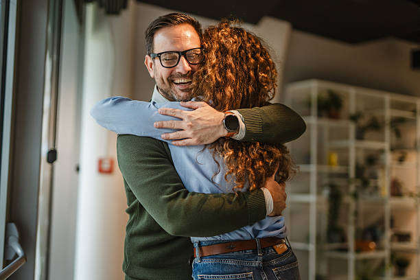 istock Happy couple embracing finding comfort and support 2250033522