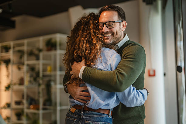Happy couple embracing finding comfort and support