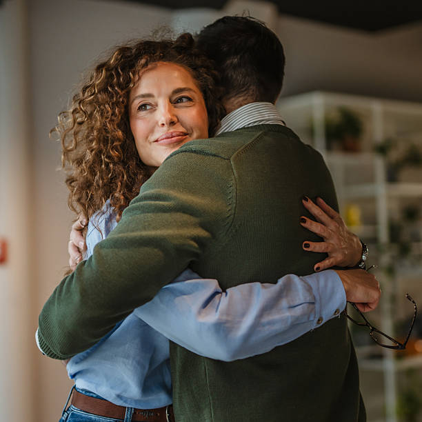 istock Happy couple embracing finding comfort and support 2250033605