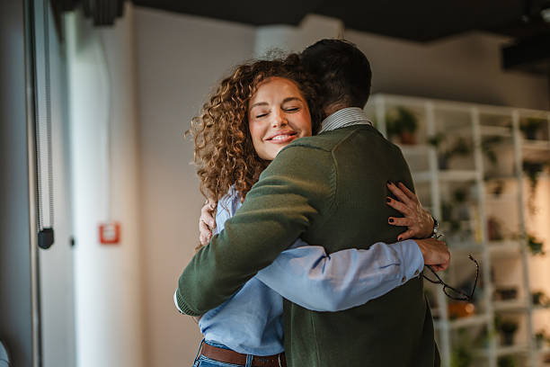 istock Happy couple embracing finding comfort and support 2250033652