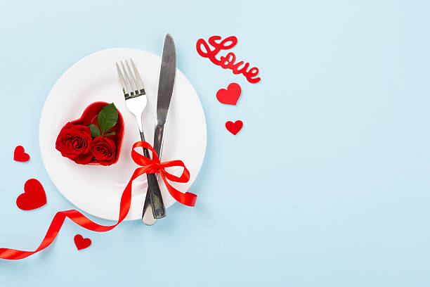 istock Table setting for Valentine's Day on color background, top view 2250034787