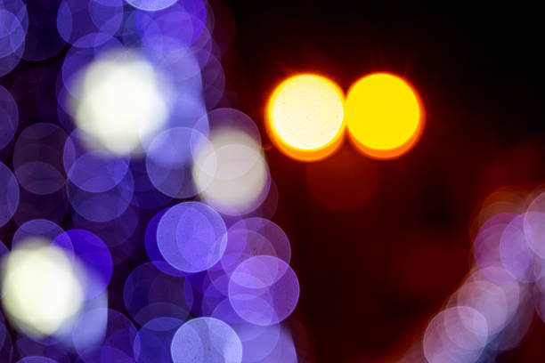 istock A mesmerizing bokeh effect with golden and multicolored lights on a dark background, ideal for holiday or dreamy compositions with a glow. 2250035810