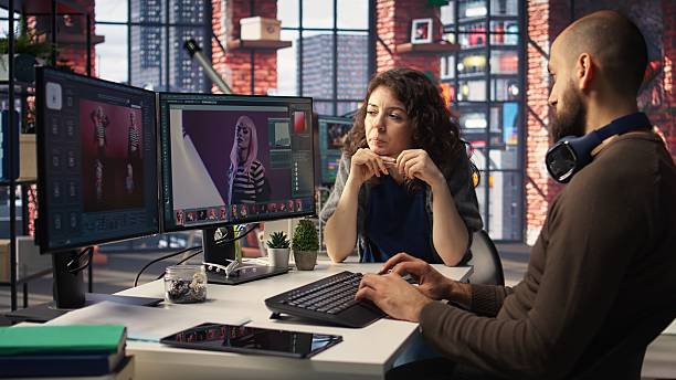 istock Man and woman creative team using AI to generate image models 2250037377