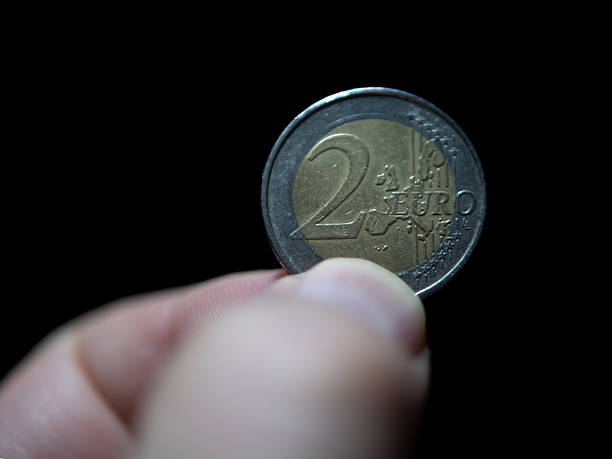 istock 2 Euro Coin from Germany in Close-Up Hold 2250041006