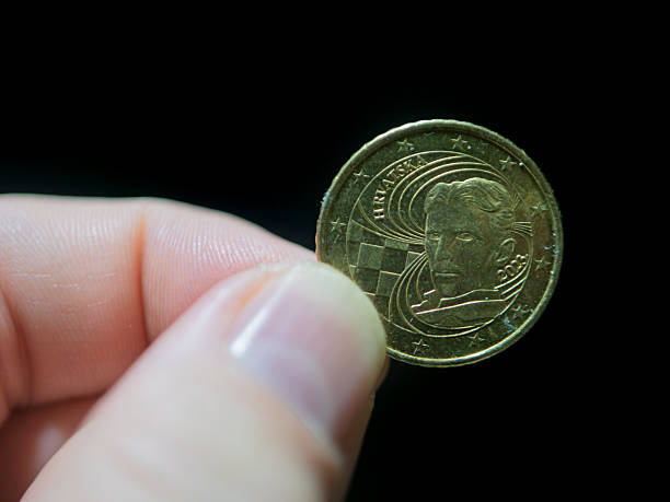 istock 50 Euro Cent Coin from Croatia Displayed in Hand 2250041023