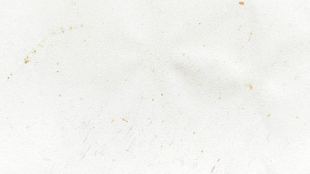 istock Distressed White Paper Texture Background with Subtle Water Stains, Dirt Specks, and Grainy Surface for Vintage Design 2250042497