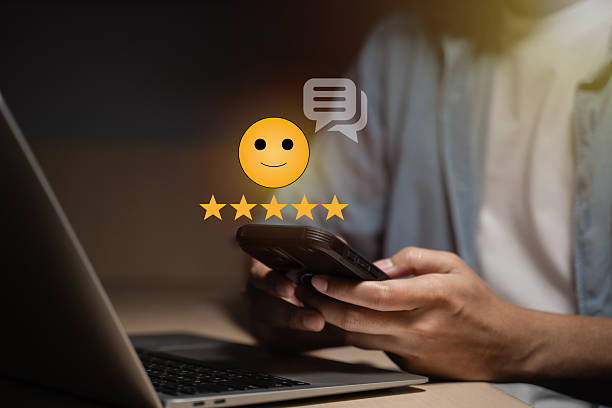 istock Users give five-star ratings using their smartphones on an online application, expressing their satisfaction. For customer satisfaction surveys, users rate their service experience. 2250045910