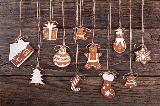 Christmas gingerbread cookies on wood rustic background