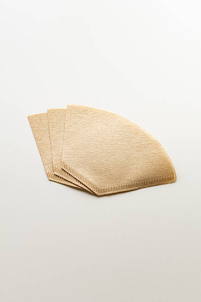 istock Paper coffee filters on a white background. 2250051538