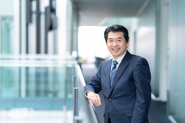 istock Middle-aged businessman working in the office 2250053180