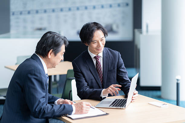 istock Businessmen having a meeting in the office 2250053259
