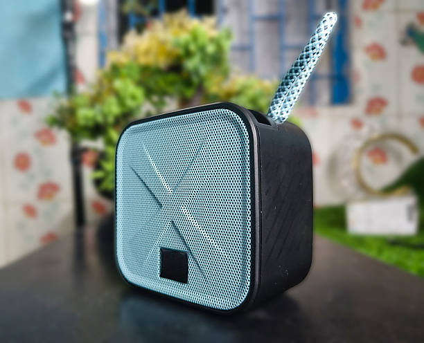istock Angled View of a Teal Portable Speaker on a Table 2250056779