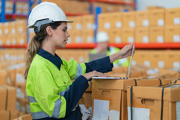 istock Warehouse worker working in warehouse storage. Foreman or worker work at factory site check up products in site. Inventory worker working in  factory Storehouse 2250061362