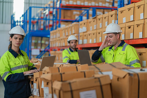 istock Warehouse worker working in warehouse storage. Foreman or worker work at factory site check up products in site. Inventory worker working in  factory Storehouse 2250061379