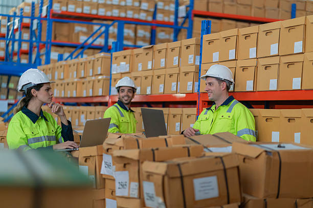 istock Warehouse worker working in warehouse storage. Foreman or worker work at factory site check up products in site. Inventory worker working in  factory Storehouse 2250061404