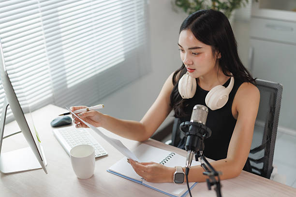 istock Young woman creating content for online podcast 2250065662