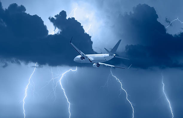 istock Airplane in the sky with thunder and lightning 2250068518