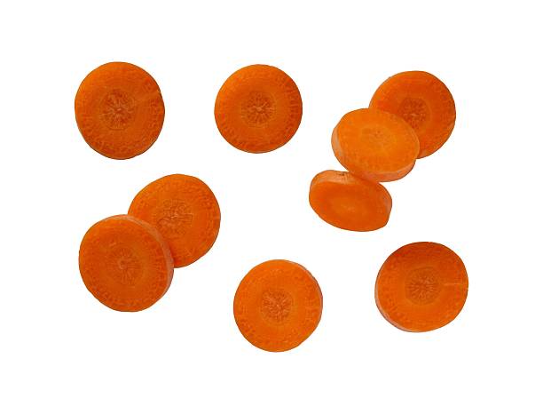 istock fresh carrot slices isolated on white 2250070934