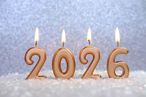 istock 2026 Golden Number Candle on Sparkling Background 2250077932