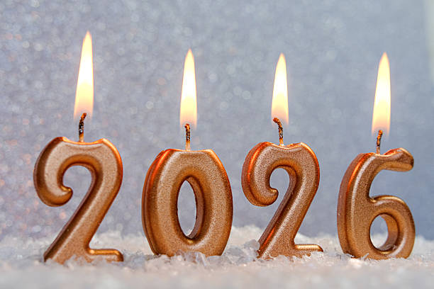 istock 2026 Golden Number Candle on Sparkling Background. 2250077933