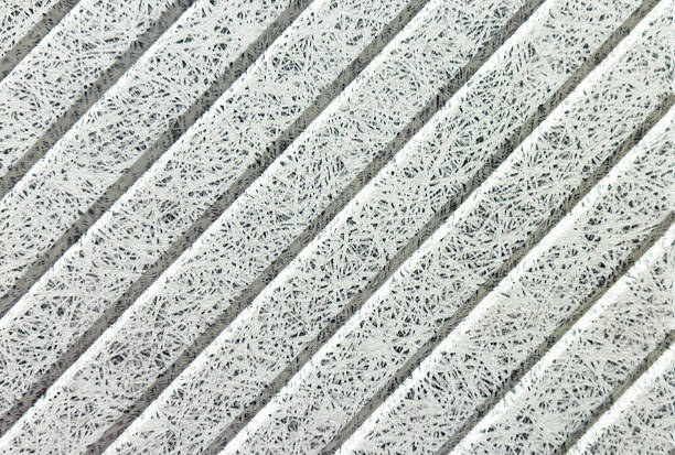 Recycle material finishing wall with vertical grooves 45 degree pattern texture background.