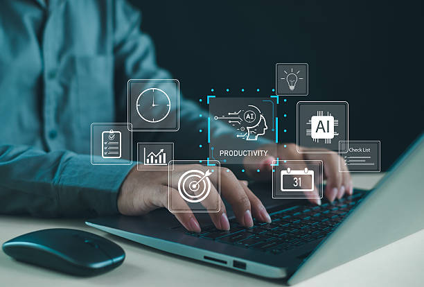 istock AI-enhanced productivity concept with hands typing on a laptop surrounded by virtual icons for tasks, analytics, scheduling, and smart automation, representing modern digital workflow optimization. 2250080328