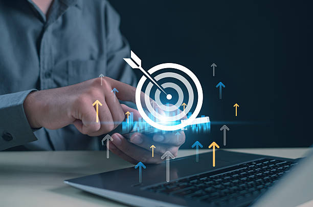 istock business professional using a mobile device with digital target icon and upward arrows, symbolizing goal achievement, business growth, performance success, strategic planning, and future development. 2250080330