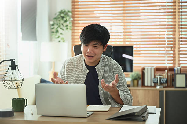 istock Digital nomad concept, Man working remote with laptop at home 2250080627