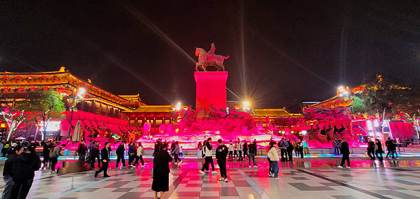 Xi'an,China-November 2,2025 : Chinese literature character statue around shopping center behide Giant wild goose pagoda in Xi'an, China.