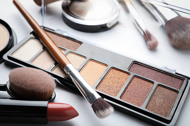 istock Eyeshadow palette, other cosmetic products and brushes on white background, closeup 2250081885