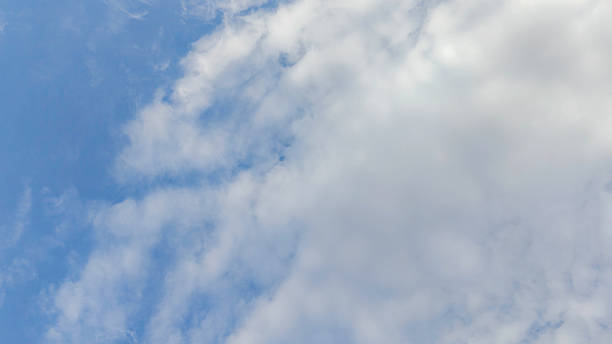 istock Bright Blue Sky with Fluffy White Cumulus Clouds on a Sunny Day 2250082167