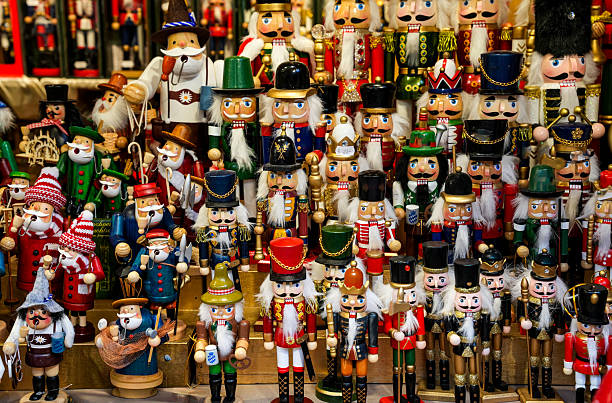 istock A collection of decorative wooden nutcracker figures. These figures typically represent people and are often used as traditional German Christmas decorations. 2250082741