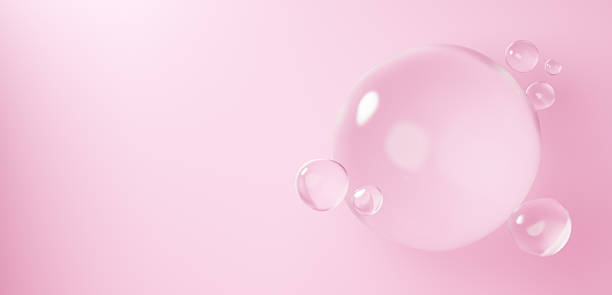 istock 3D Illustration.Multiple water spheres floating against a pink background. Water droplets. Copy space. (Horizontal) 2250084064